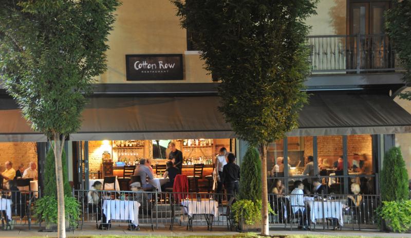 Evening dining scene on the patio of Cotton Row Restaurant in downtown Huntsville