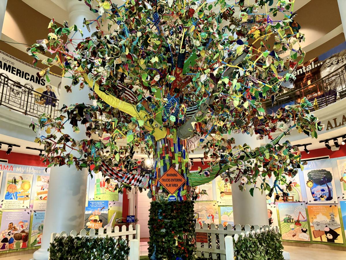 Colorful interactive tree exhibit inside the EarlyWorks Museum Complex in Huntsville, Alabama.