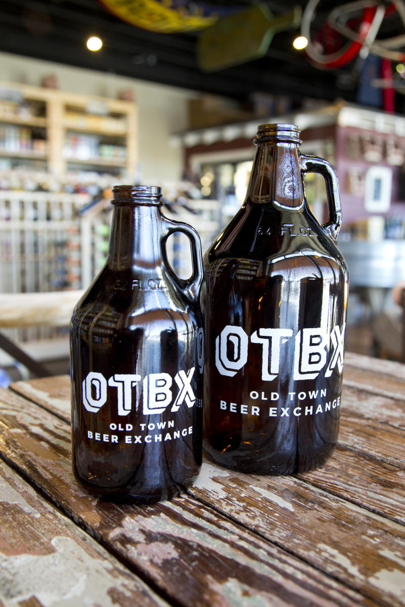 2 beer growlers from Old Town Beer Exchange in Huntsville, AL